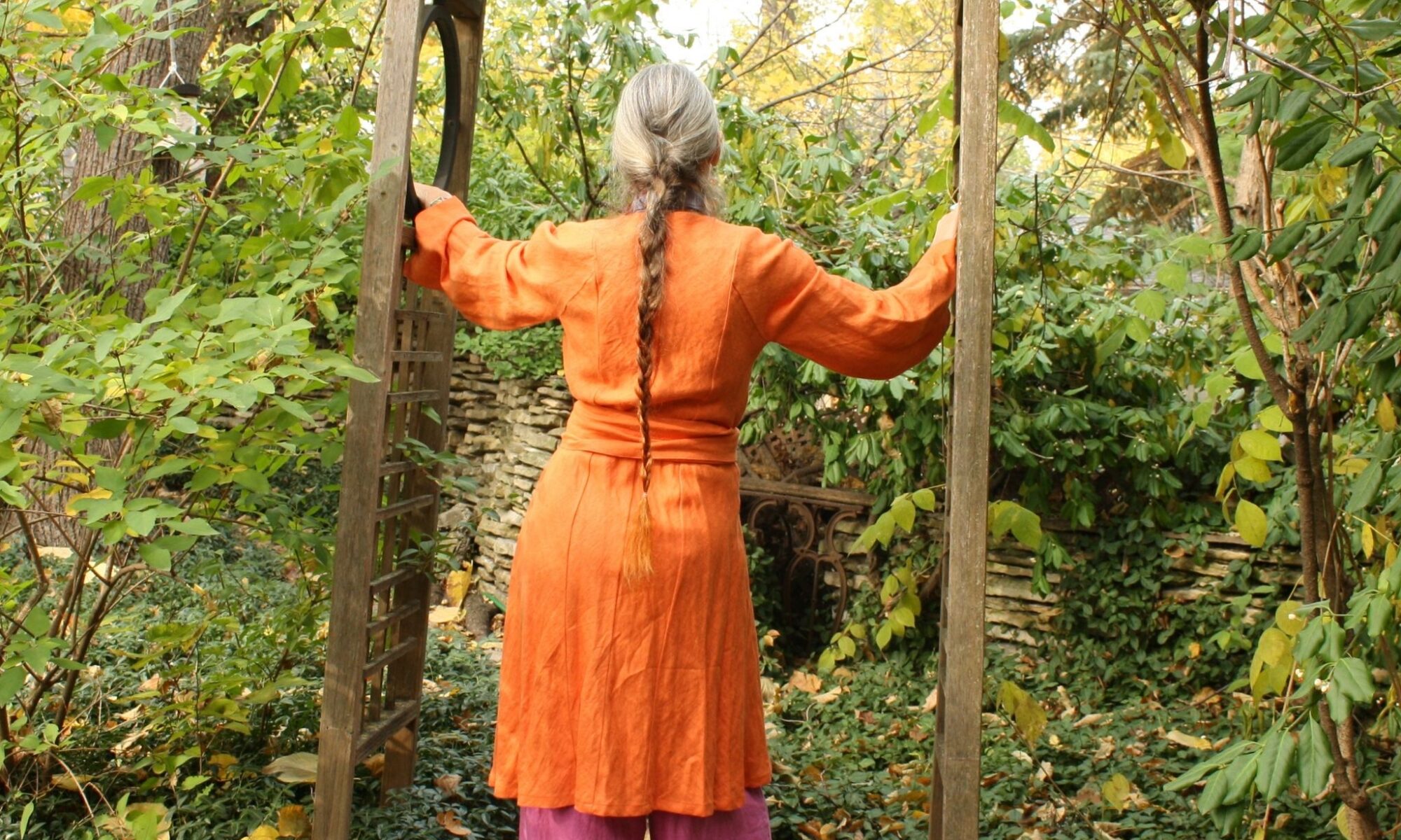 Raspberry pink wide leg linen pants and orange linen wrap jacket (back view) by Hello My Goddess